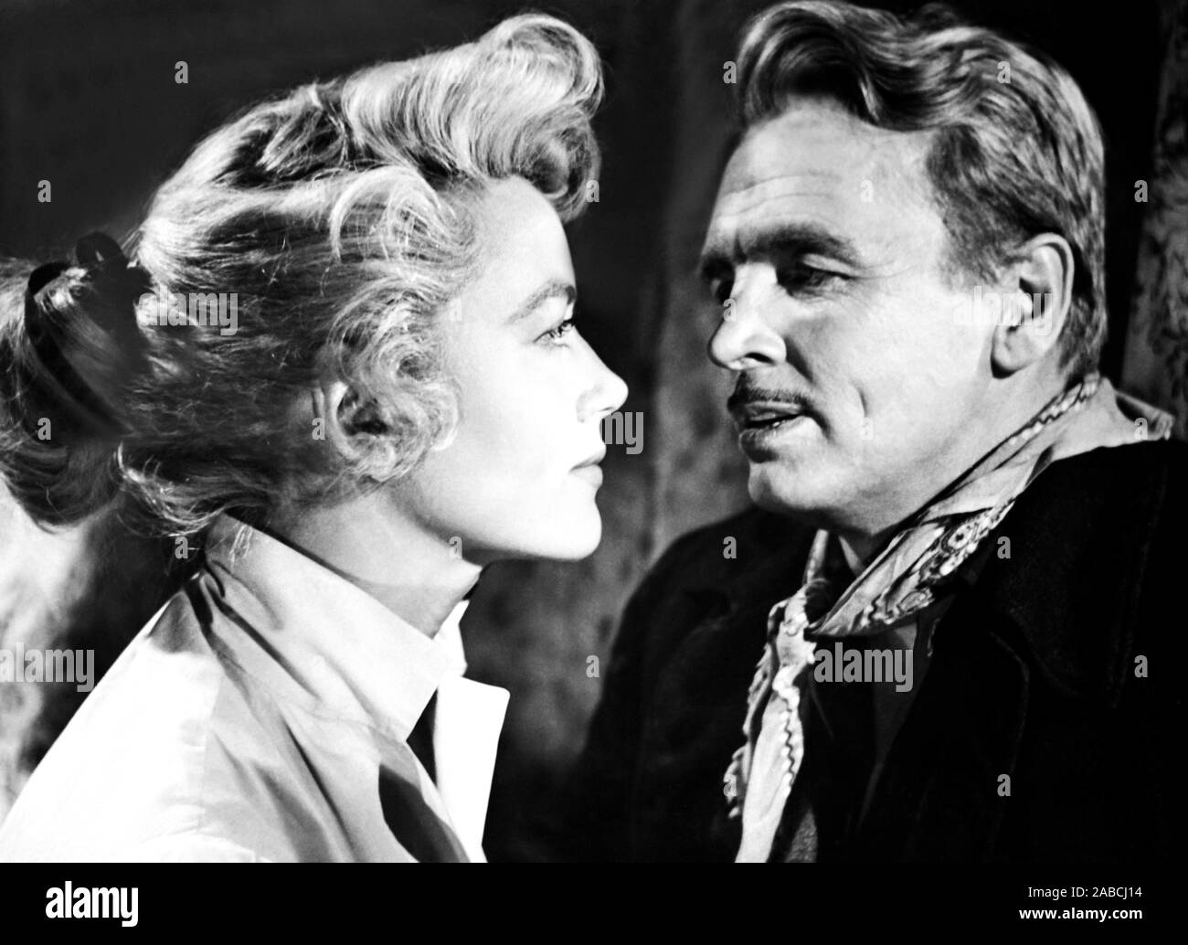 FIVE GUNS WEST, from left, Dorothy Malone, John Lund, 1955 Stock Photo