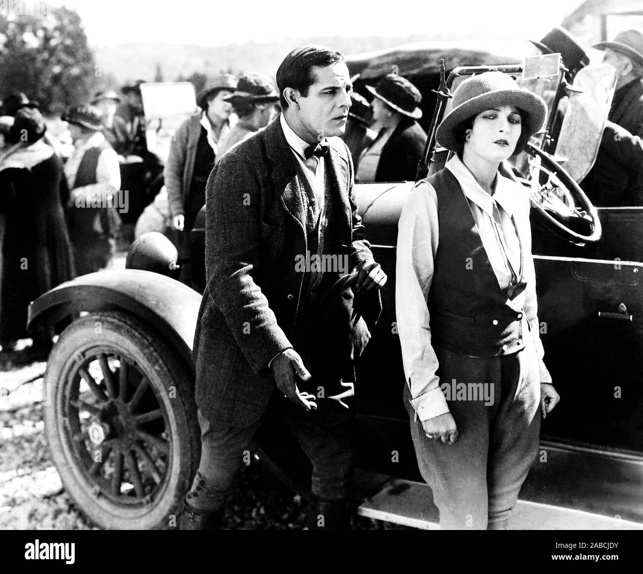 FLAMING BARRIERS, from left, Antonio Moreno, Jacqueline Logan, 1924 Stock Photo