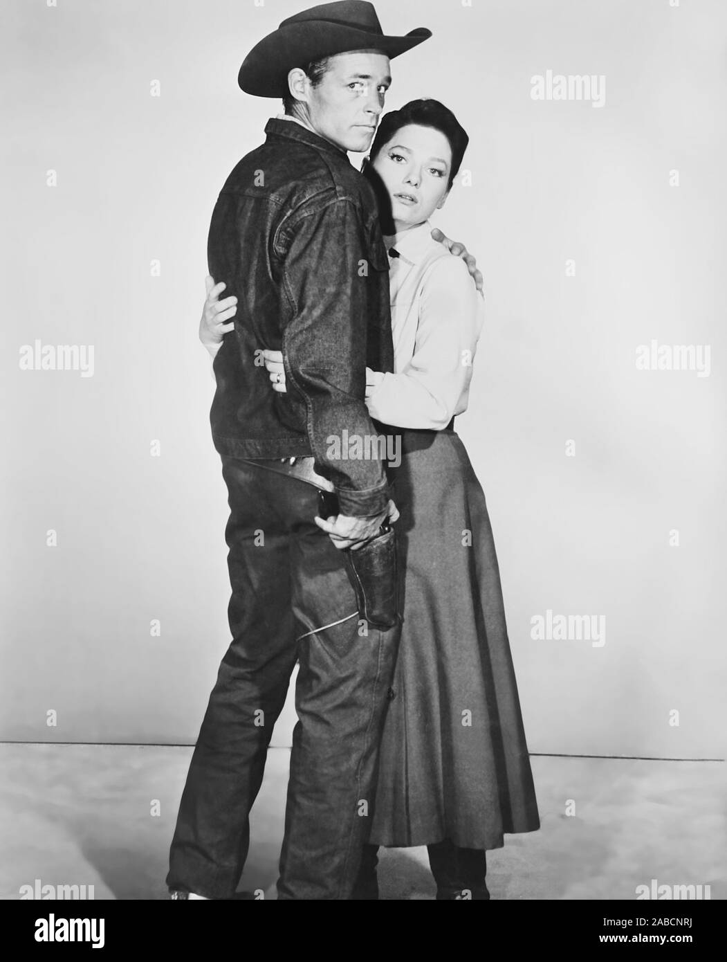 THE HARD MAN, from left: Guy Madison, Valerie French, 1957 Stock Photo ...