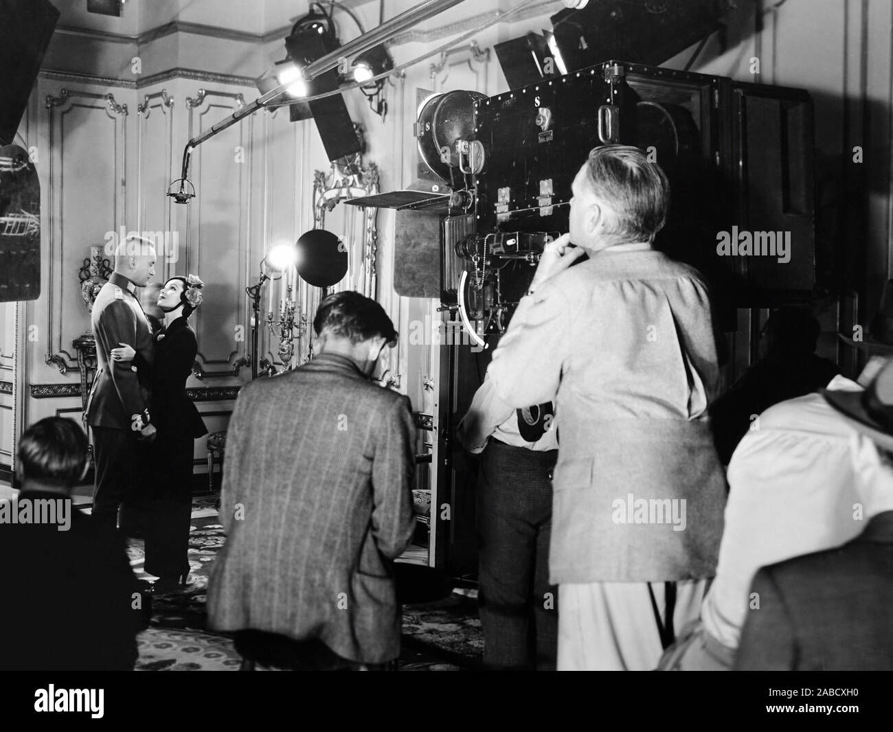 LANCER SPY, from left: George Sanders, Dolores del Rio filming on set ...