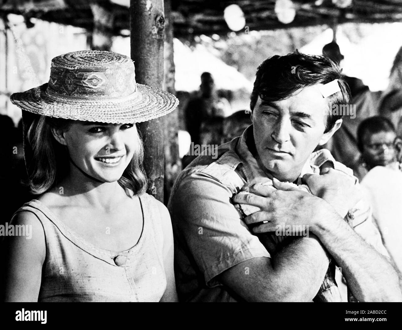 MISTER MOSES, from left, Carroll Baker, Robert Mitchum, 1965 Stock Photo