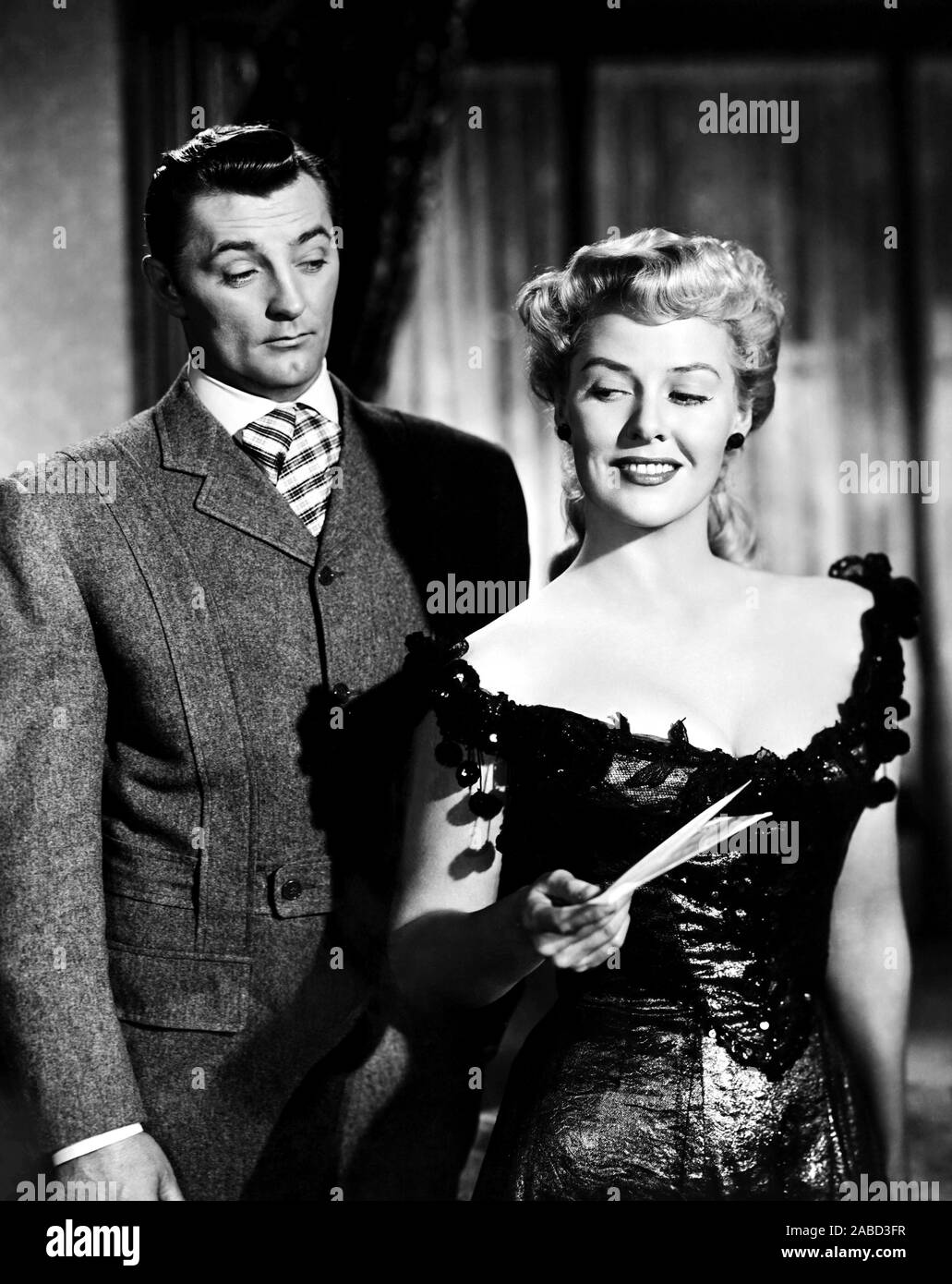 MY FORBIDDEN PAST, from left, Robert Mitchum, Janis Carter, 1951 Stock ...