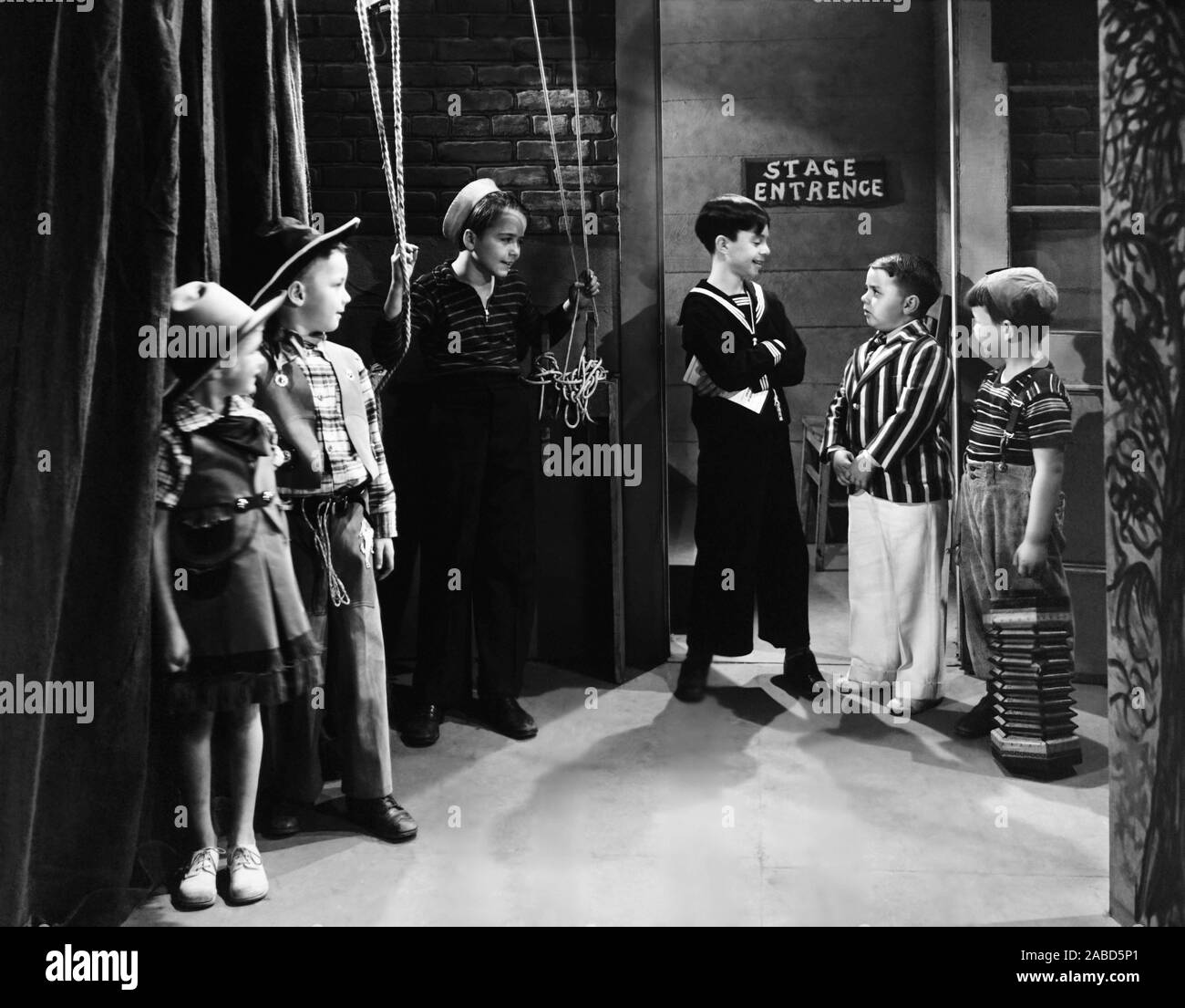 OUR GANG FOLLIES OF 1938, center to right: Carl 'Alfalfa' Switzer, Spanky McFarland, Eugene 'Porky' Lee, 1937 Stock Photo