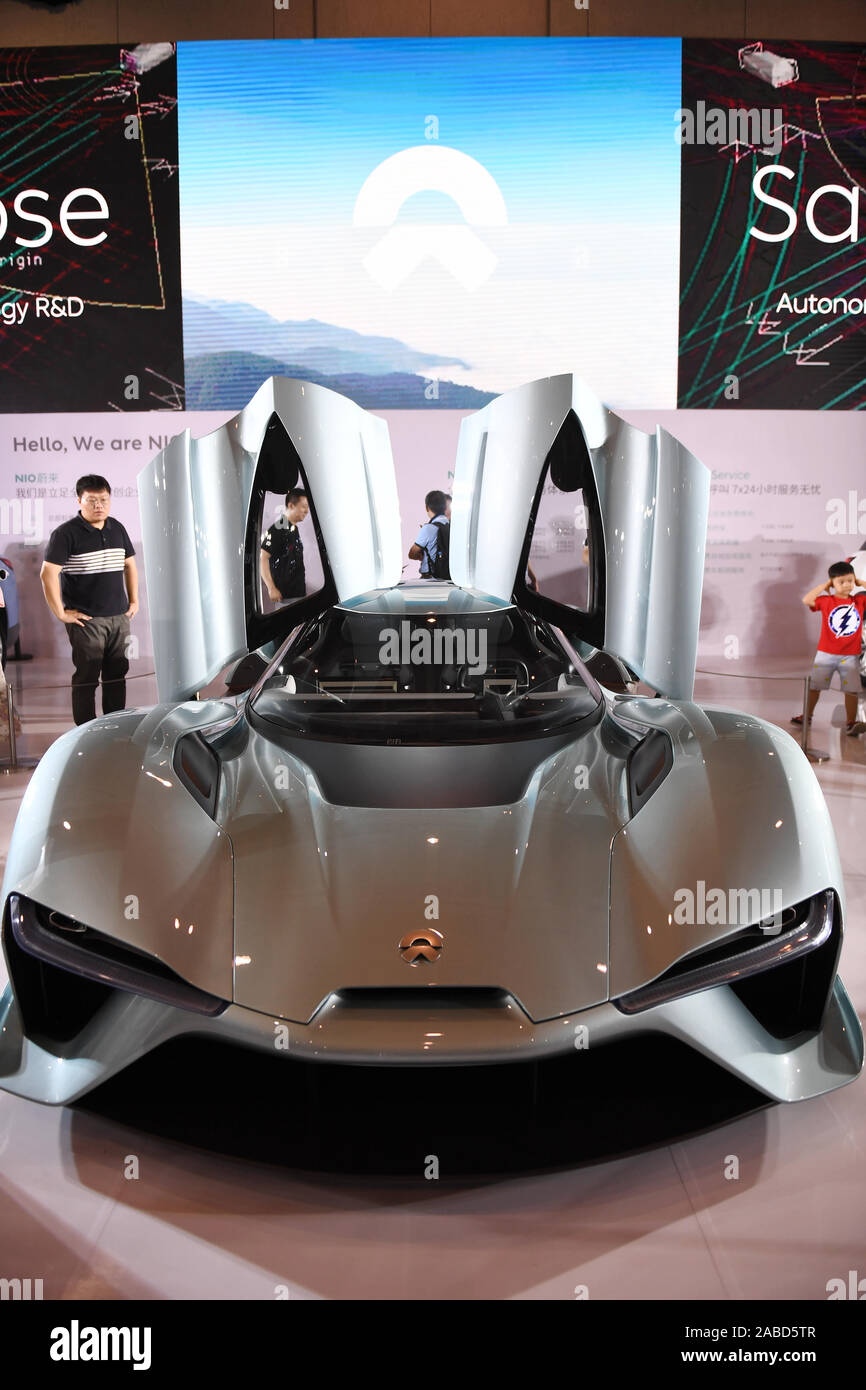 People look at NIO EP9, an electric-powered, two-seat sports car at the 18th Nanjing International Automobile Exhibition in Nanjing, east China's Jian Stock Photo