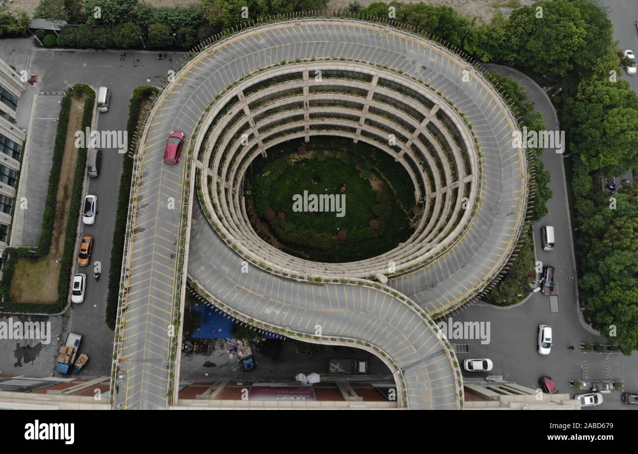 A car drives on the circular parking lot in a community in Hangzhou