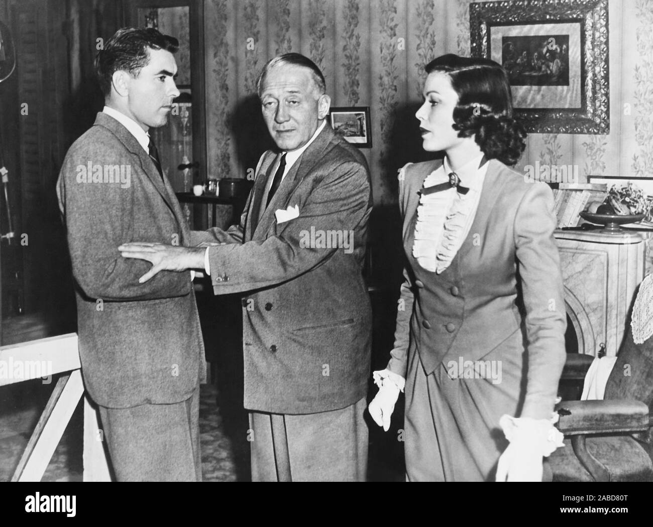 THE RAZOR'S EDGE, from left: Tyrone Power, director Edmund Goulding ...