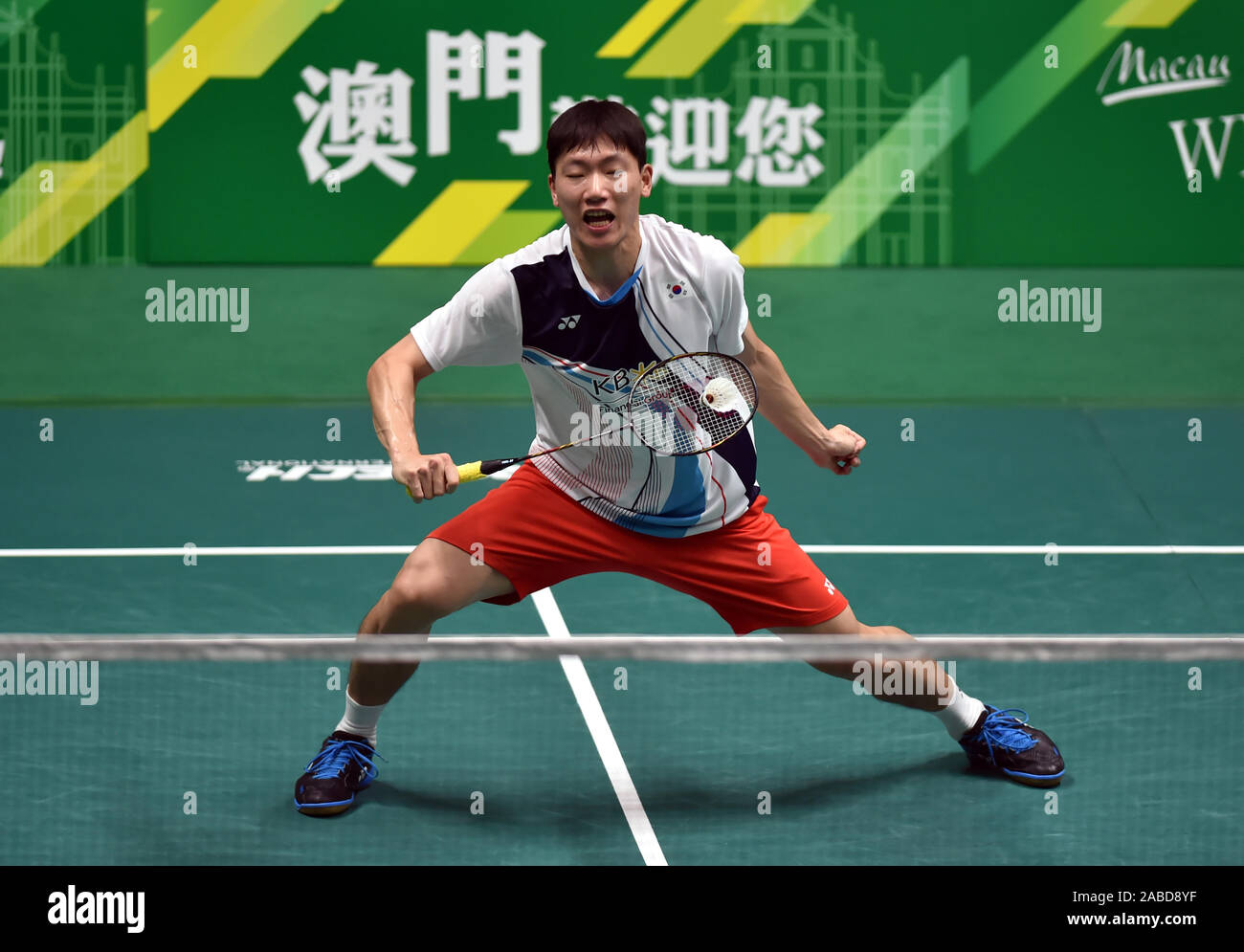Lee Dong-keun of South Korea competes against Cheam June Wei of ...