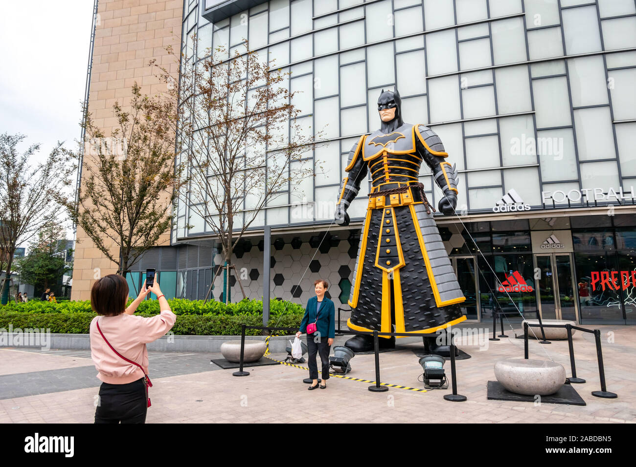 An eight-meter-high sculpture of fictional superhero Batman appears to  remark 80th anniversary of Batman's birth and draws attention of local  citizens Stock Photo - Alamy