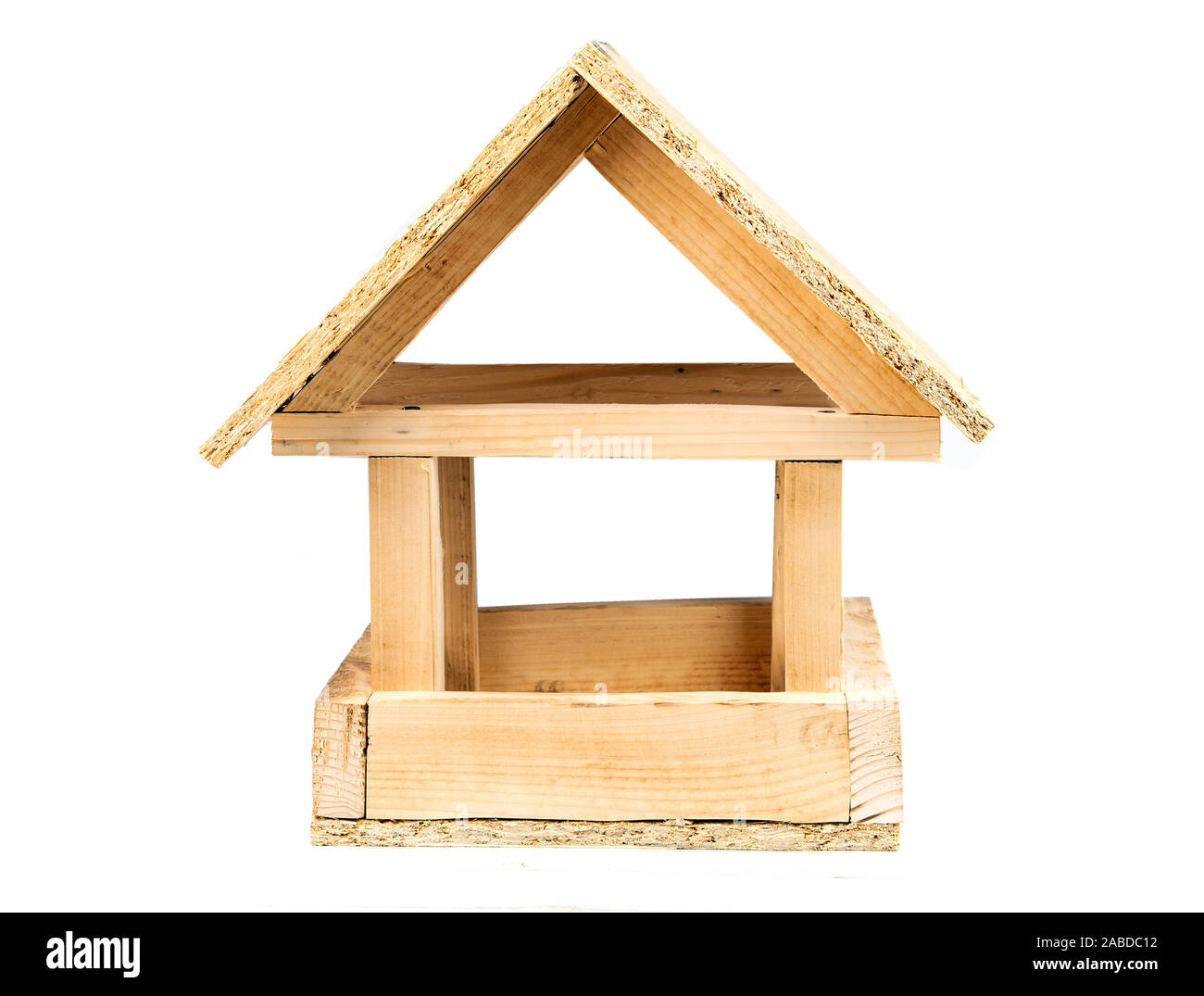 simple homemade wooden bird feeder isolated on white Stock Photo
