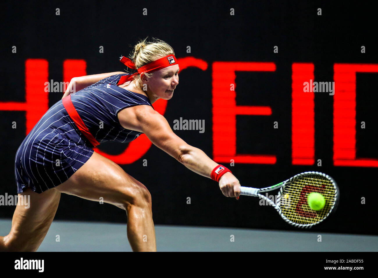 Dutch professional tennis player Kiki Bertens competes against Australian professional tennis player Ashleigh Barty during a group match of WTA Finals Stock Photo