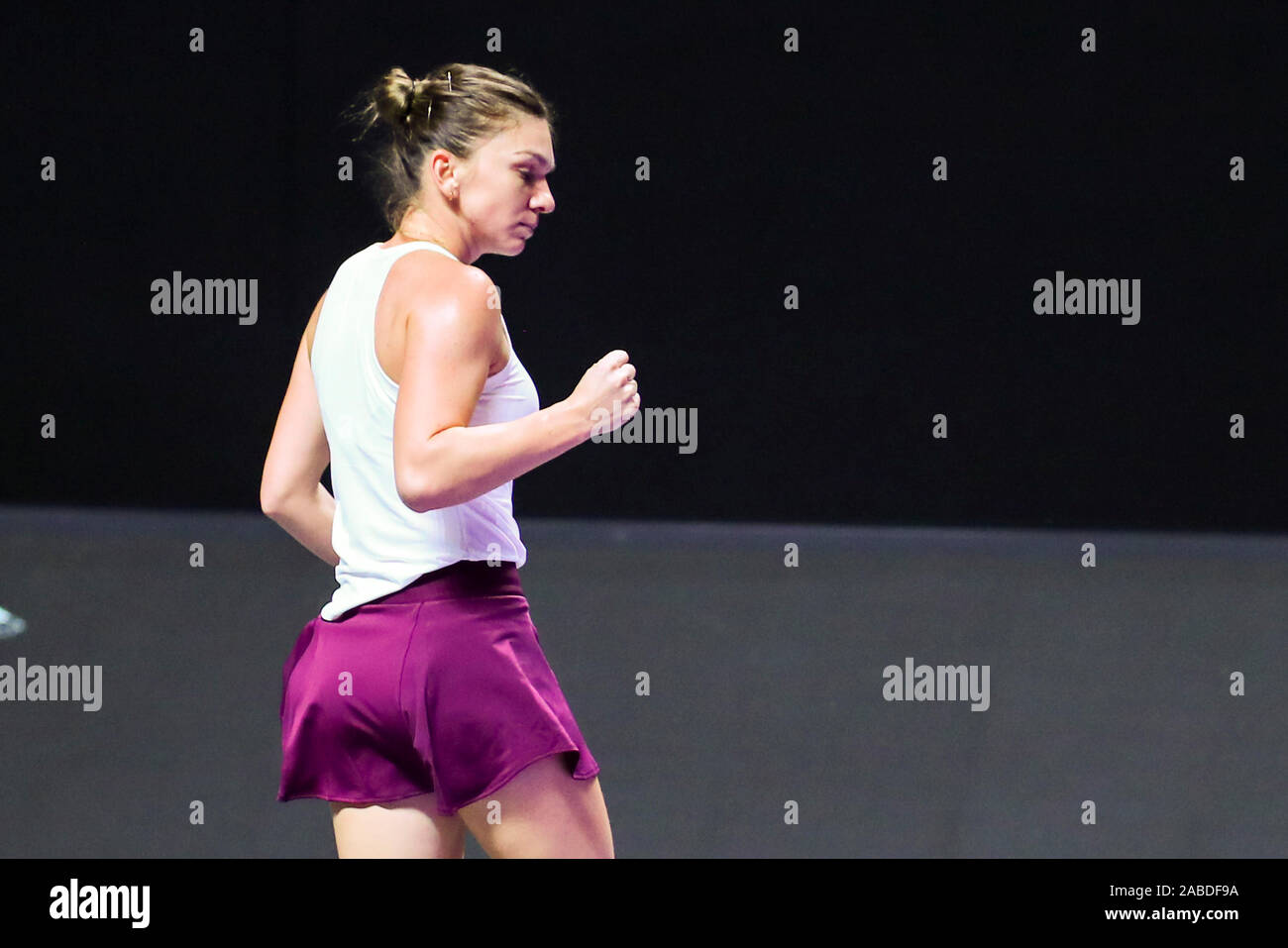 Romanian professional tennis player Simona Halep competes against Canadian professional tennis player Bianca Andreescu during a group match of WTA Fin Stock Photo