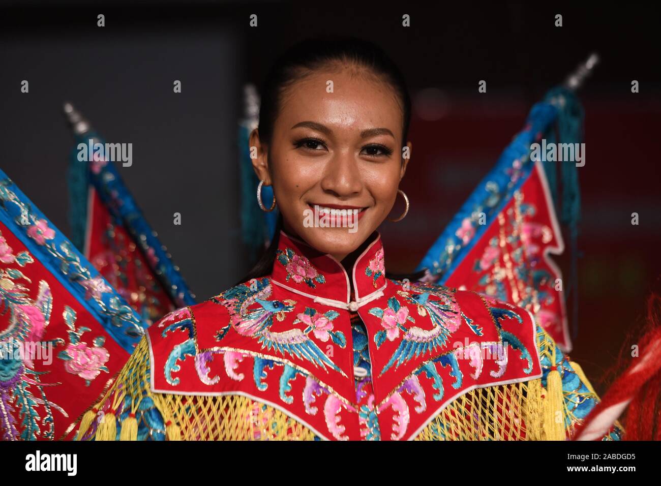 51 models who were participants of the grand final of the Miss Globalcity 2019 step into Jinan Peking Opera Theatre and experience Peking Opera by try Stock Photo
