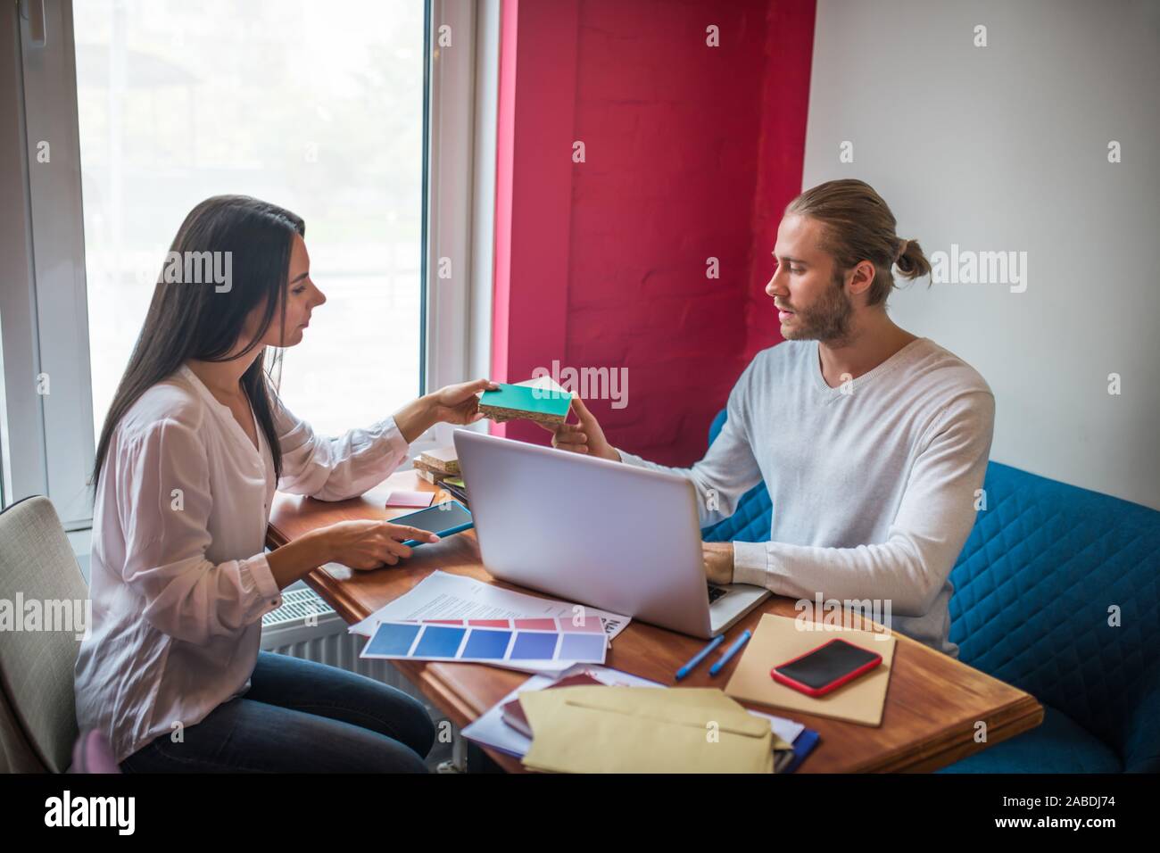 Couple of interior designers working together while planning project Stock Photo