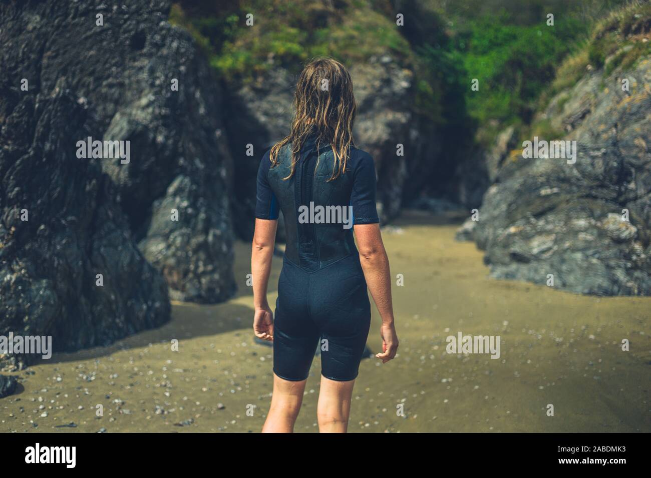 Woman wearing a wetsuit hi-res stock photography and images - Alamy