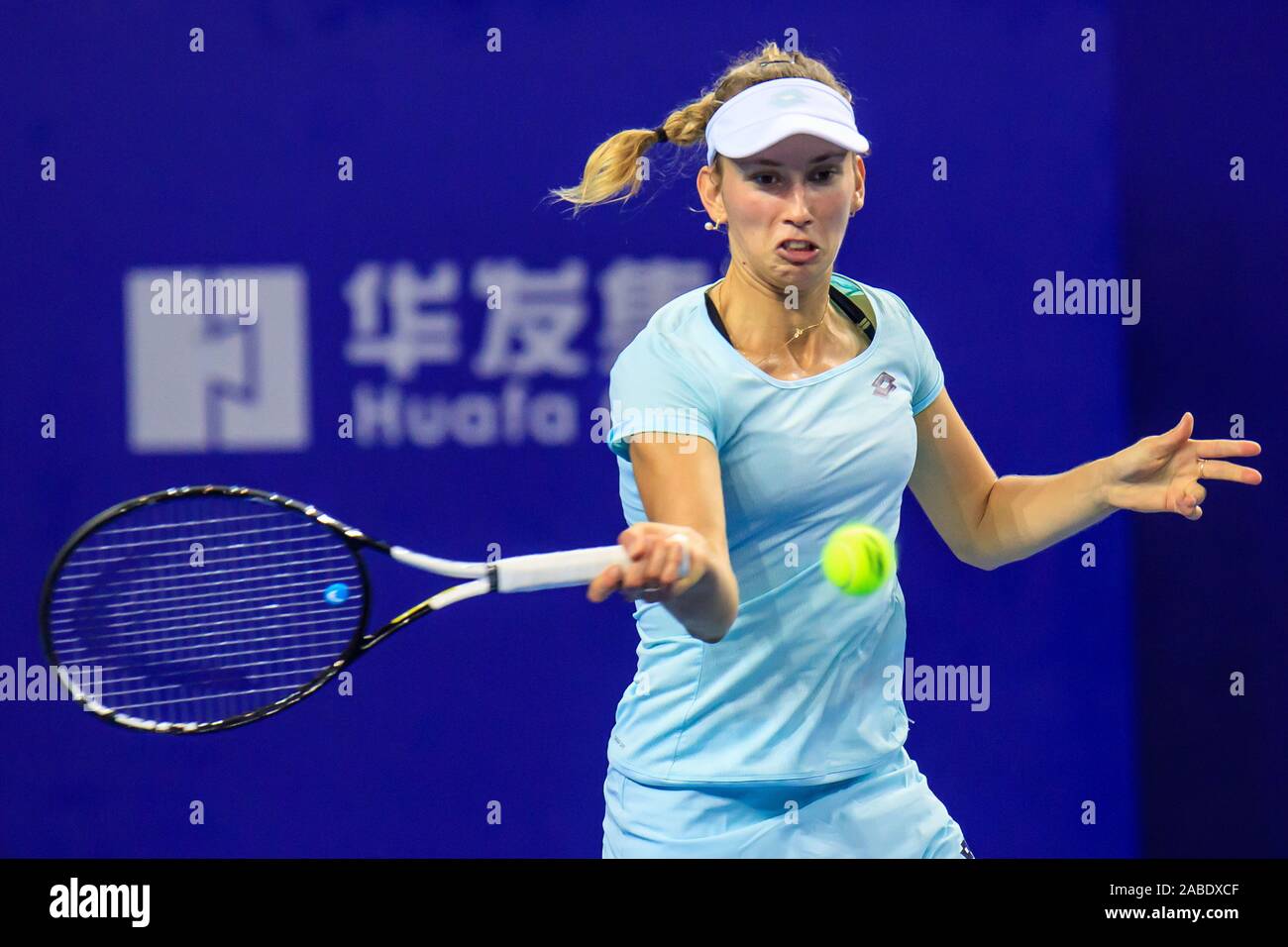 Elise Mertens of Belgium gets the ball against Aryna Sabalenka of