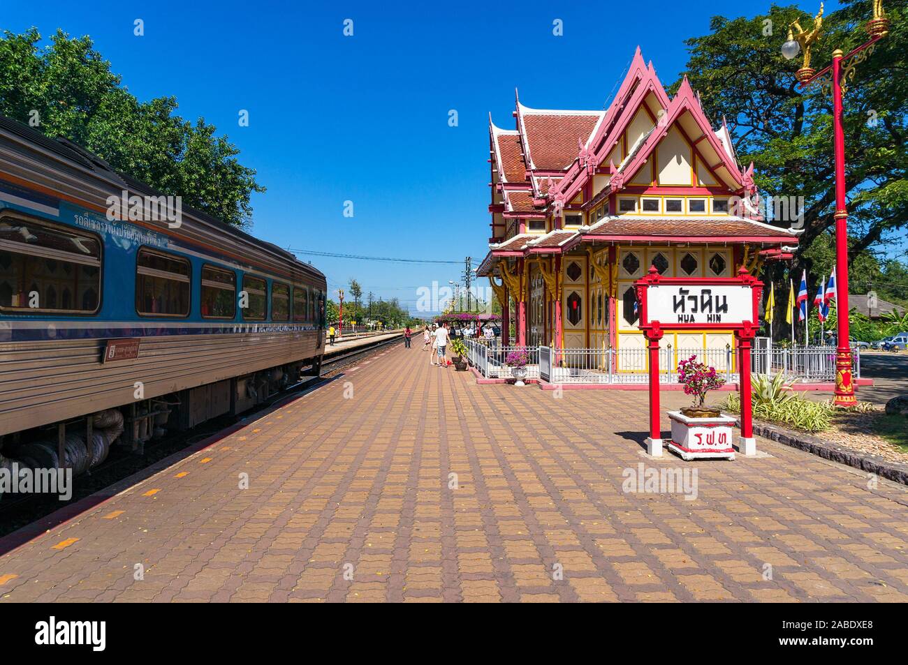 Hua Hin, Thailand - December 26, 2015: Hua Hin railway station platform with view of arriving train Stock Photo