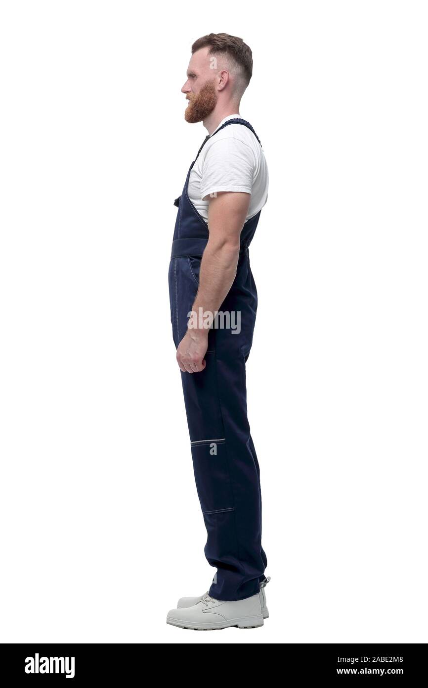 side view. confident man in overalls . isolated on white Stock Photo - Alamy