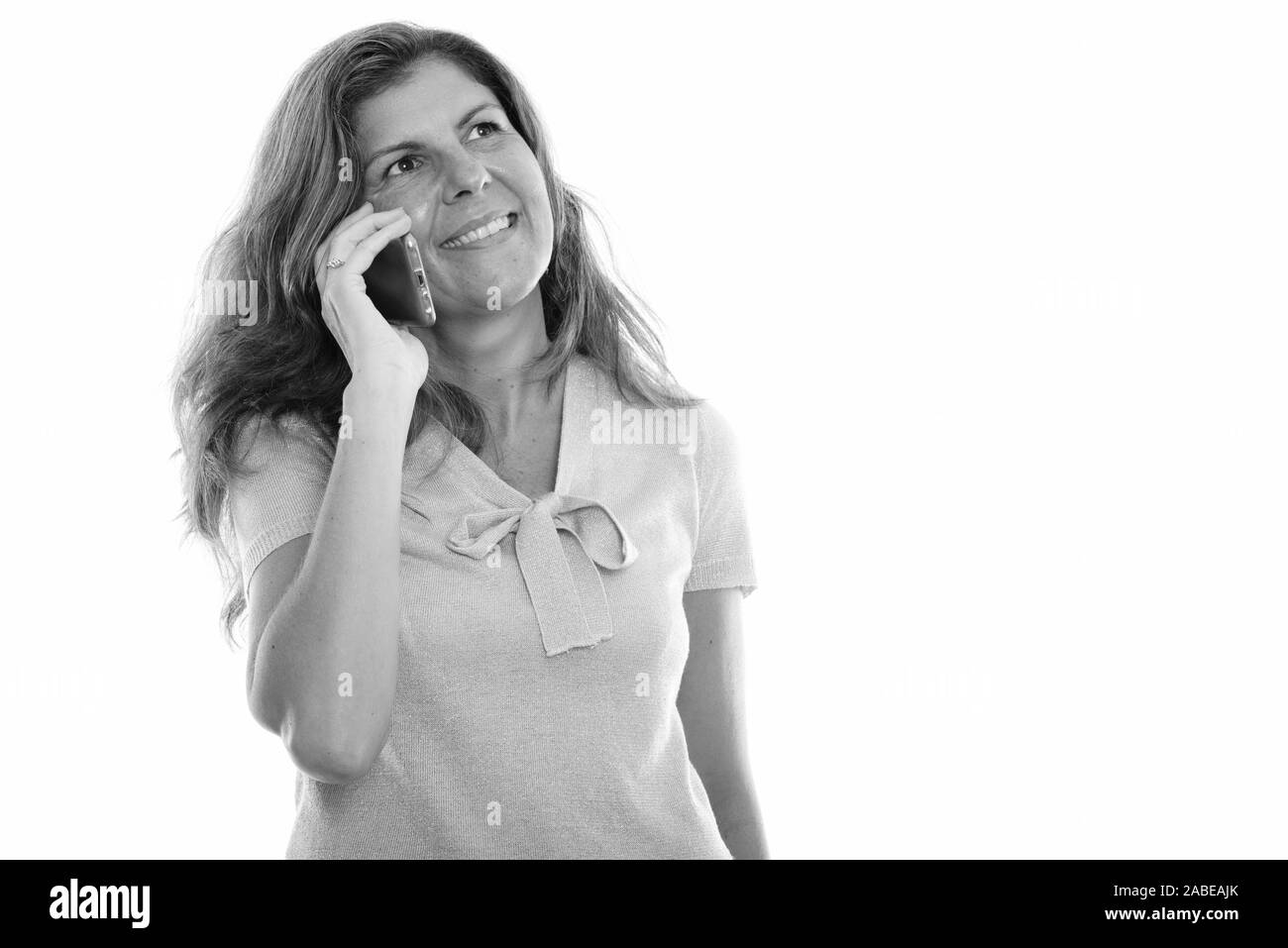 Happy mature woman calling hi-res stock photography and images - Alamy