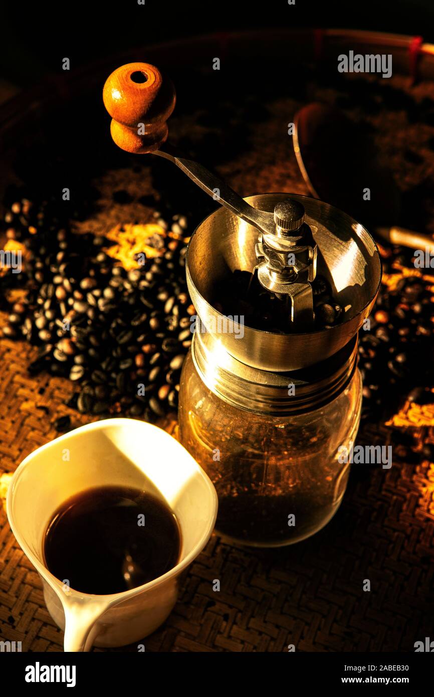 coffee grinder and roasted of coffee bean Stock Photo Alamy