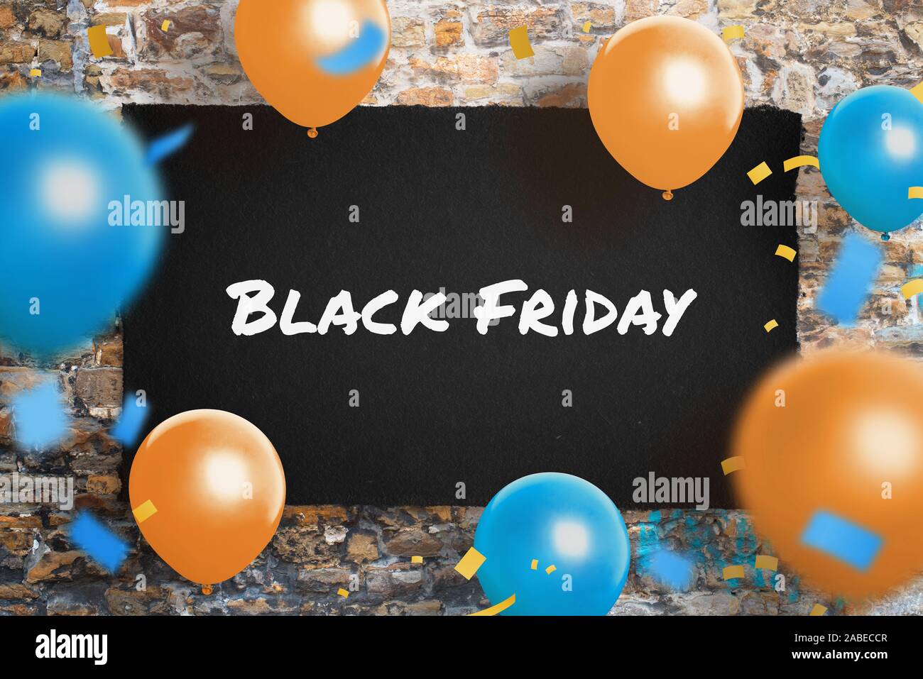 Black Friday poster on wall surrounded with ballons and confetty. Concept of shopping holiday promotion. Stock Photo