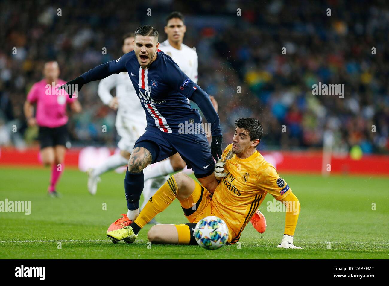 Real Madrid Cf S Tibaut Courtois And Mauro Icardi Of Psg Are Seen In Action During The Uefa Champions League Match Between Real Madrid And Paris Saint Germain At Santiago Bernabeu Stadium In Real Madrid Cf S Tibaut Courtois And Mauro Icardi Of Psg Are Seen In Action During The Uefa Champions League Match Between Real Madrid And Paris Saint Germain At Santiago Bernabeu Stadium In