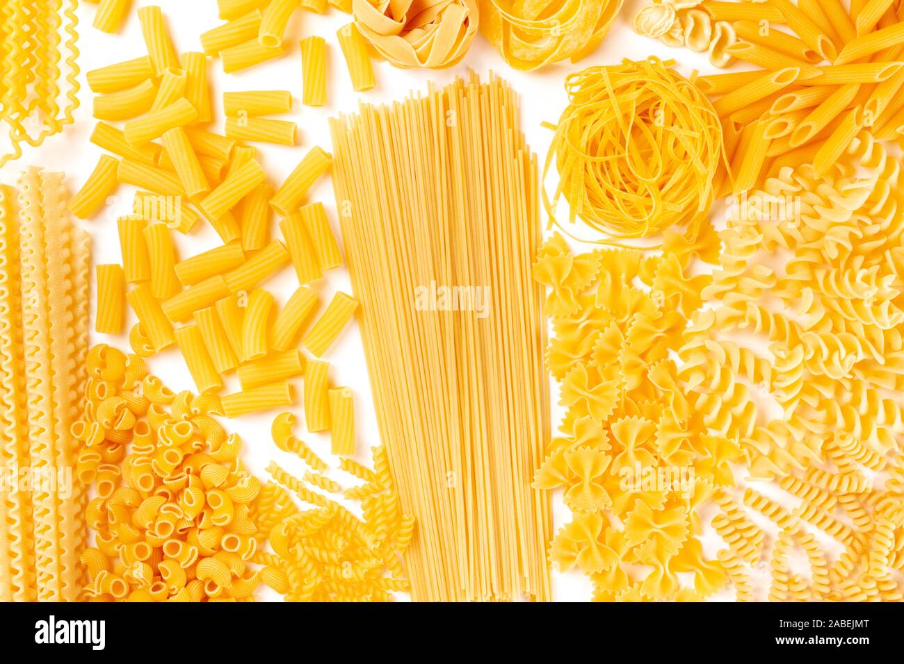 Textured Pasta Italian pasta texture, flat lay banner, shot from above on a white ...