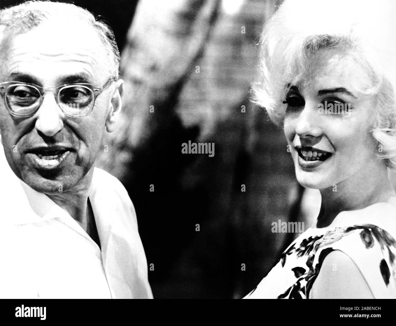 SOMETHING'S GOT TO GIVE, from left, director George Cukor, Marilyn Monroe, on-set, April 1962, TM & Copyright ©20th Century Fox Film Corp./courtesy Everett Collection Stock Photo