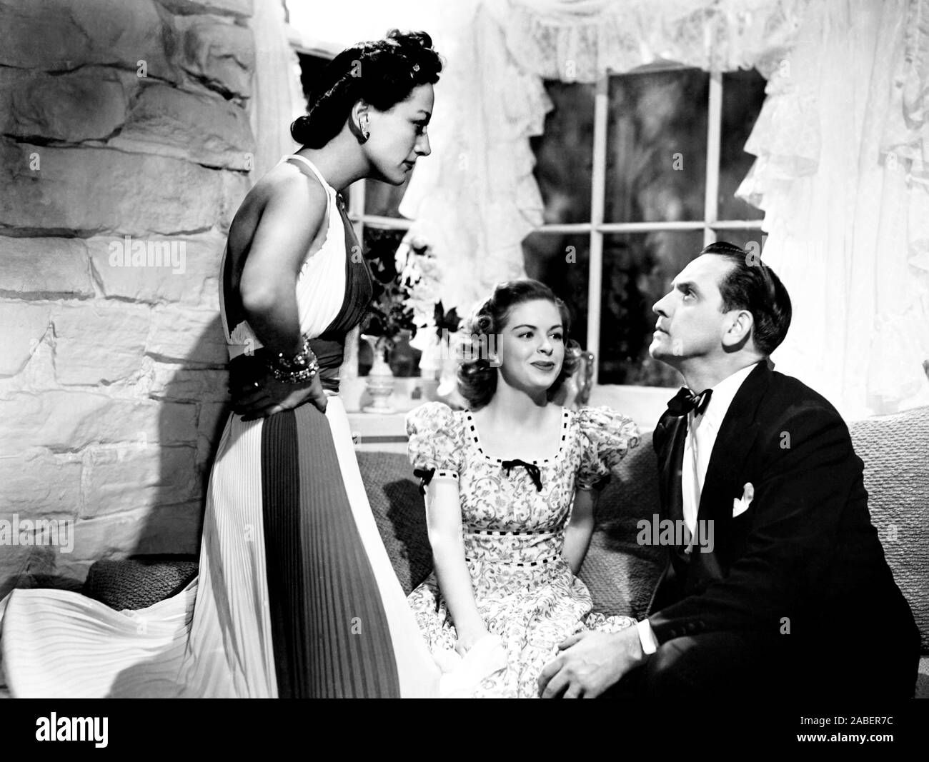 SUSAN AND GOD, from left, Joan Crawford, Rita Quigley, Fredric March ...