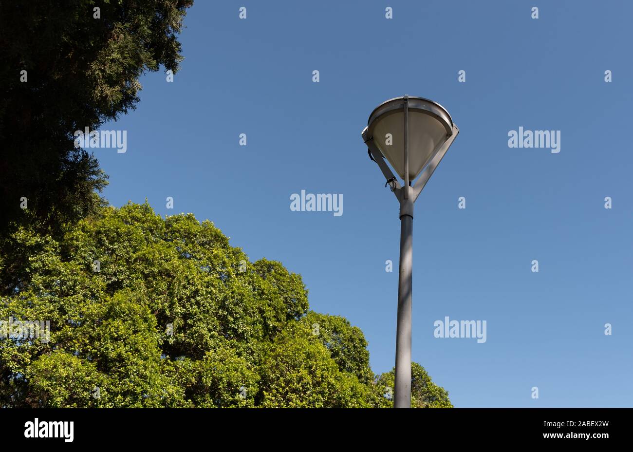 An old light fixture component of the public lighting of a square in southern Brazil. Lighting