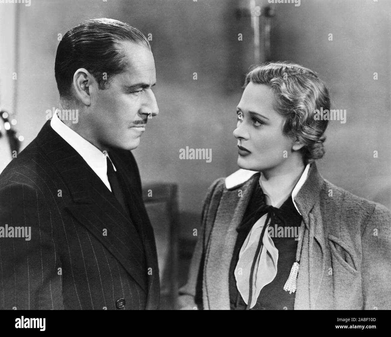 WHISPERING ENEMIES, from left: Jack Holt, Dolores Costello, 1939 Stock ...