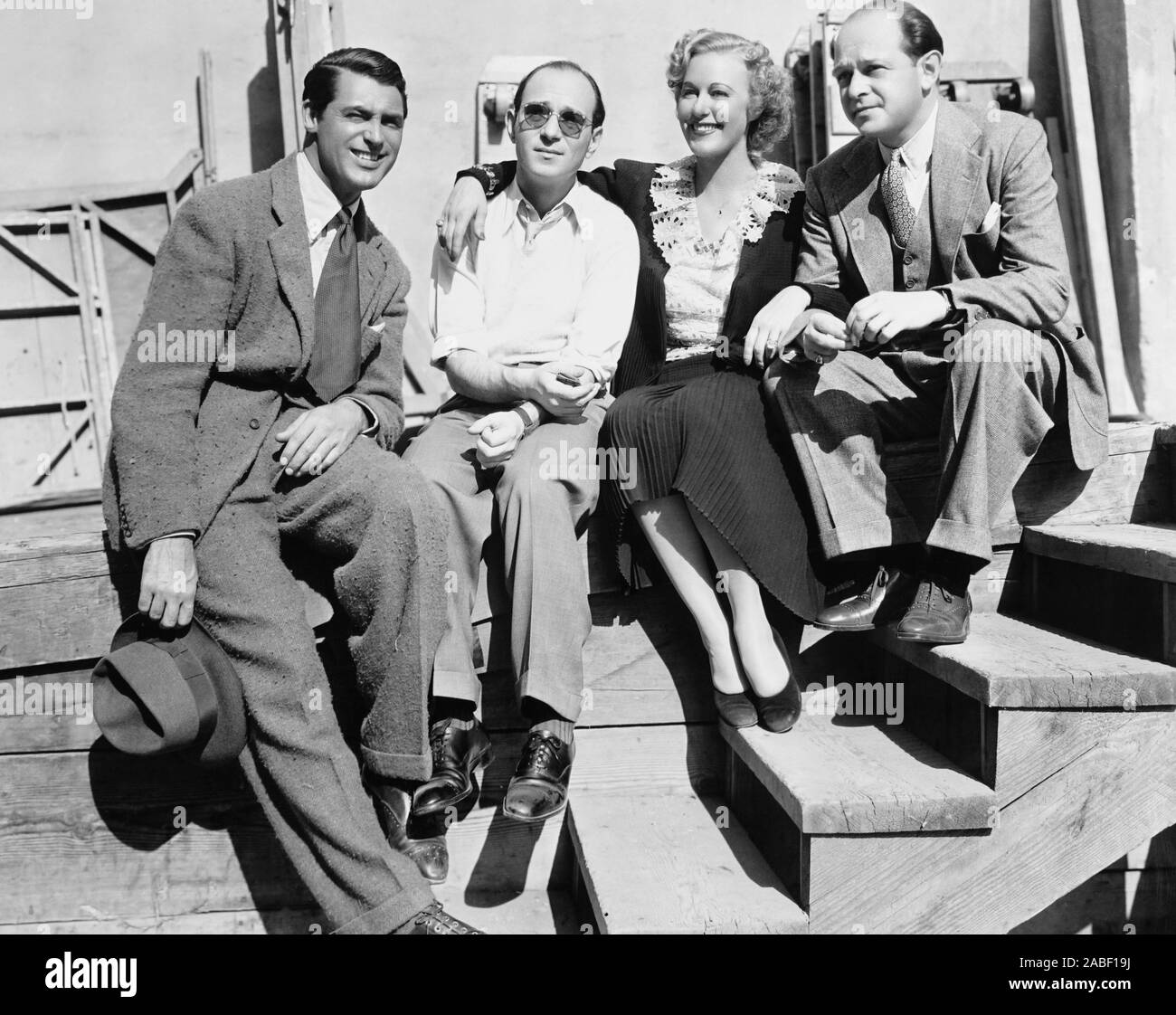 Robbert Rikić WHEN YOU'RE IN LOVE, from left: Cary Grant, director Robert Riskin ...