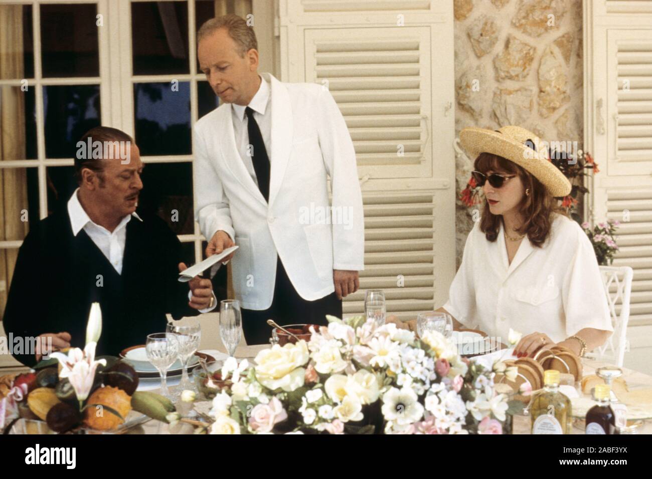 DIRTY ROTTEN SCOUNDRELS, from left: Michael Caine, Ian McDiarmid, Glenne Headly, 1988, © Orion/courtesy Everett Collection Stock Photo