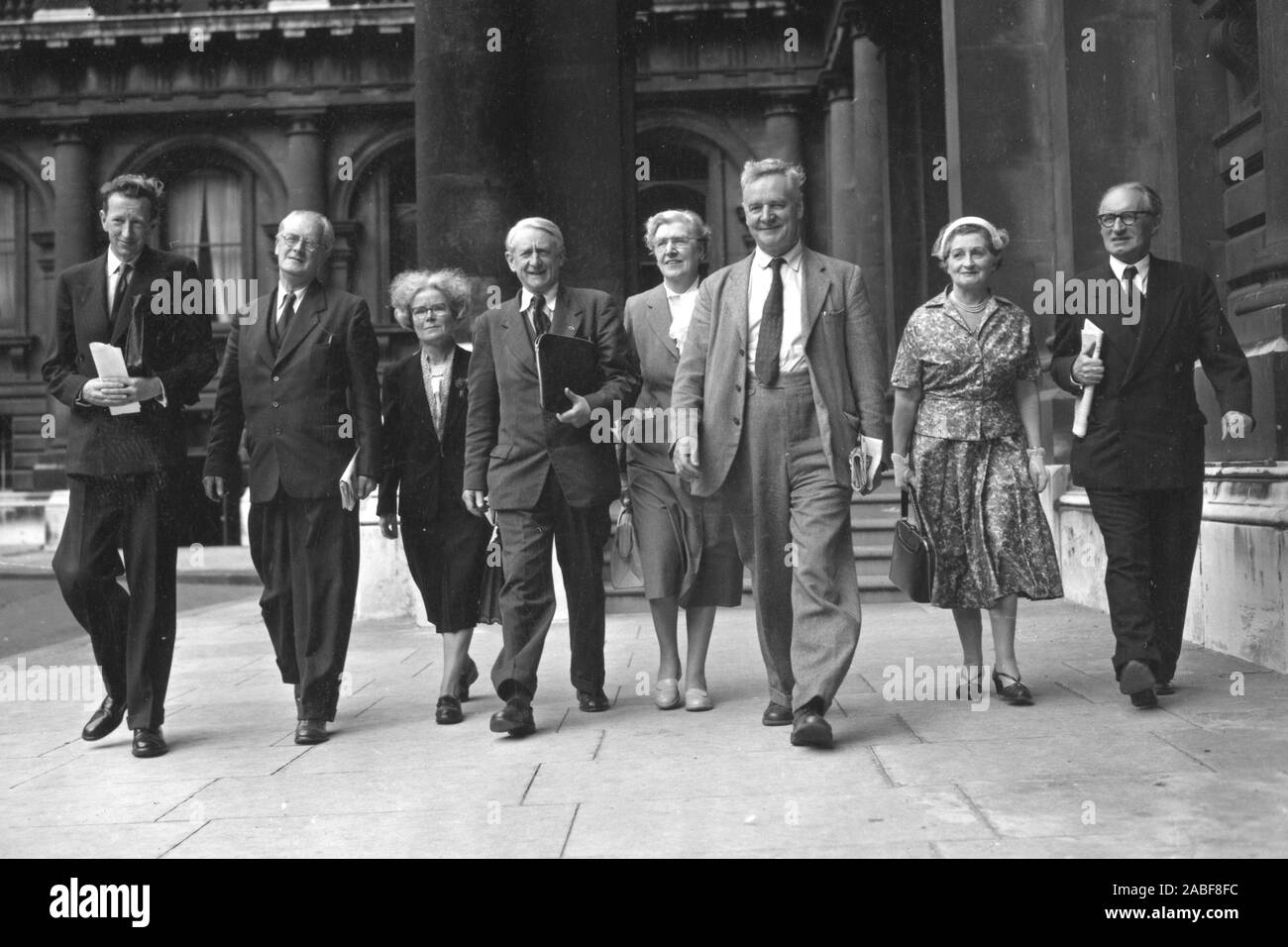 Pictured at the Foreign Office, Downing Street, London are members of a deputation - including two MPs - organised by the Peace Pledge Union. The object of their visit was to ask the Government to suspend mobilisation and to use the London conference on the Suez Canal as a stepping stone to negotiations with Colonel Nasser and not as 'a means of dictating to him'.  In the deputation are (L-R) Hugh Brock, A. Fenner Brockway, MP (Labour, Eton and Slough), Professor Dame Kathleen Lonsdale, Stuart Morris, Secretary of the Peace Pledge Union, Sybil Morrison, Emrys Hughes, MP (Labour, South Ayrshire Stock Photo