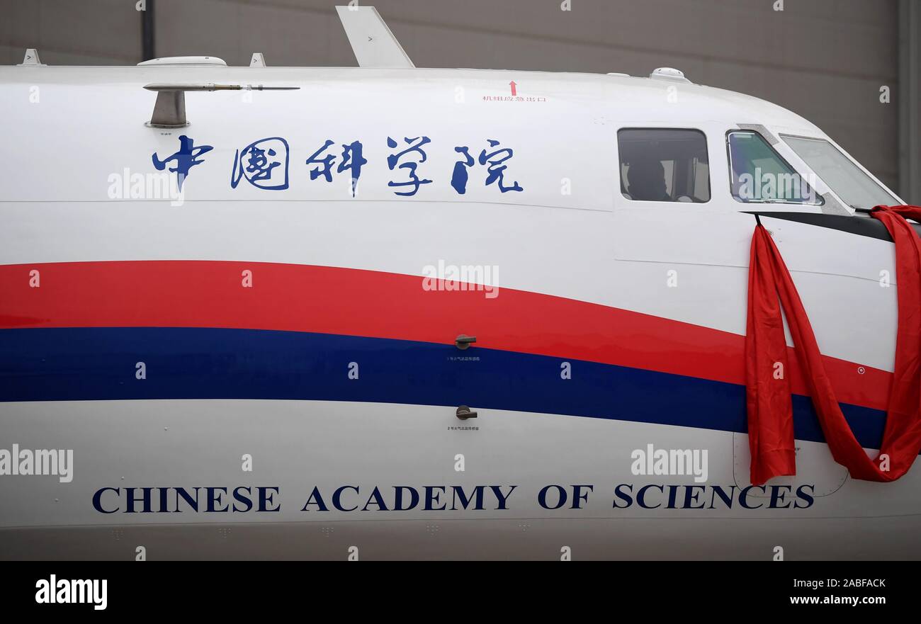 (191127) -- XI'AN, Nov. 27, 2019 (Xinhua) -- Photo taken on Nov. 27, 2019 shows a Xinzhou-60 aircraft for remote sensing in Xi'an, northwest China's Shaanxi Province. China's aircraft maker Xi'an Aircraft Industry Co. (XAC) has delivered two high-performance Xinzhou-60 aircraft for remote sensing to the Chinese Academy of Sciences (CAS) for aerial observation missions. Ding Yaxiu, chief designer of the aircraft, said the aerial observation aircraft is adapted from the Xinzhou-60 aircraft developed by the company to better address the demand of carrying different functional equipment for div Stock Photo