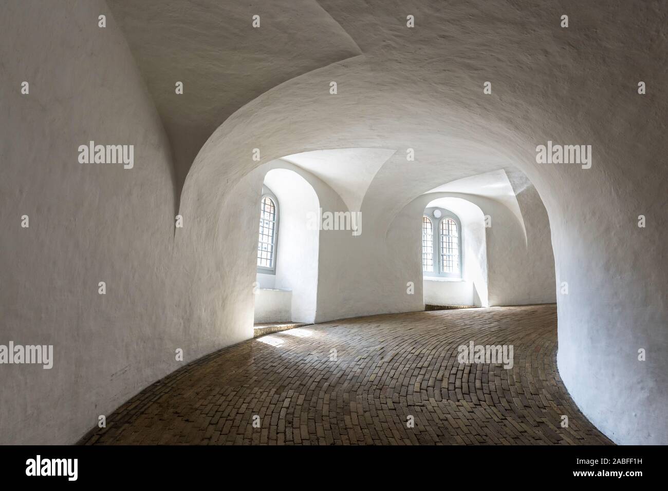 Copenhagen round tower, view of the famous equestrian staircase or helical ramp that takes visitors to the top of the Rundetårn in central Copenhagen Stock Photo