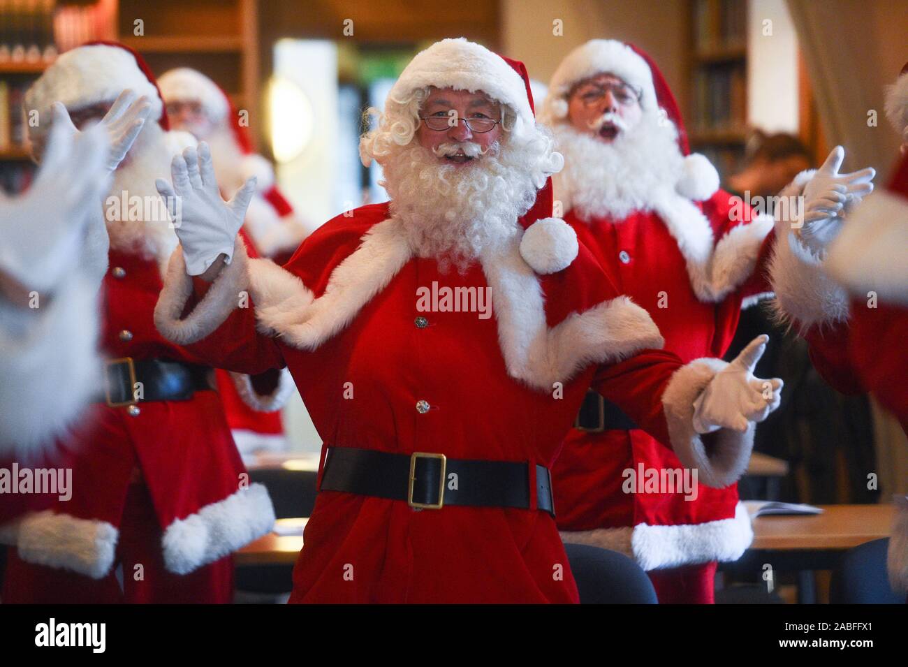 Father Christmas performers in a classroom during the 23rd annual Santa School at Southwark Cathedral in London. PA Photo. Picture date: Wednesday November 27, 2019. With a global shortage of Santas, the Ministry of Fun is boosting numbers by holding the school in the capital. Photo credit should read: Kirsty O'Connor/PA Wire Stock Photo