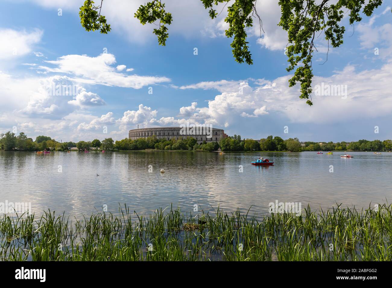 Panorama view of the Documentation Center and Congress Hall of the Nazi Party Rally Grounds in Nuremberg, with the Dutzendteich lake in the foreground Stock Photo