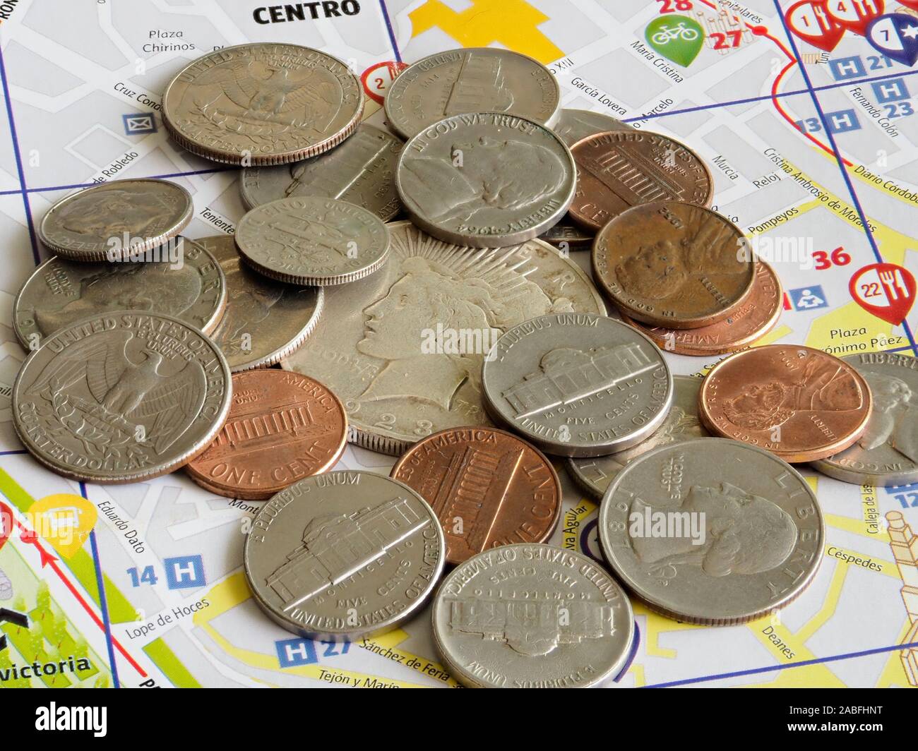 close-up stack of american coins on a map Stock Photo