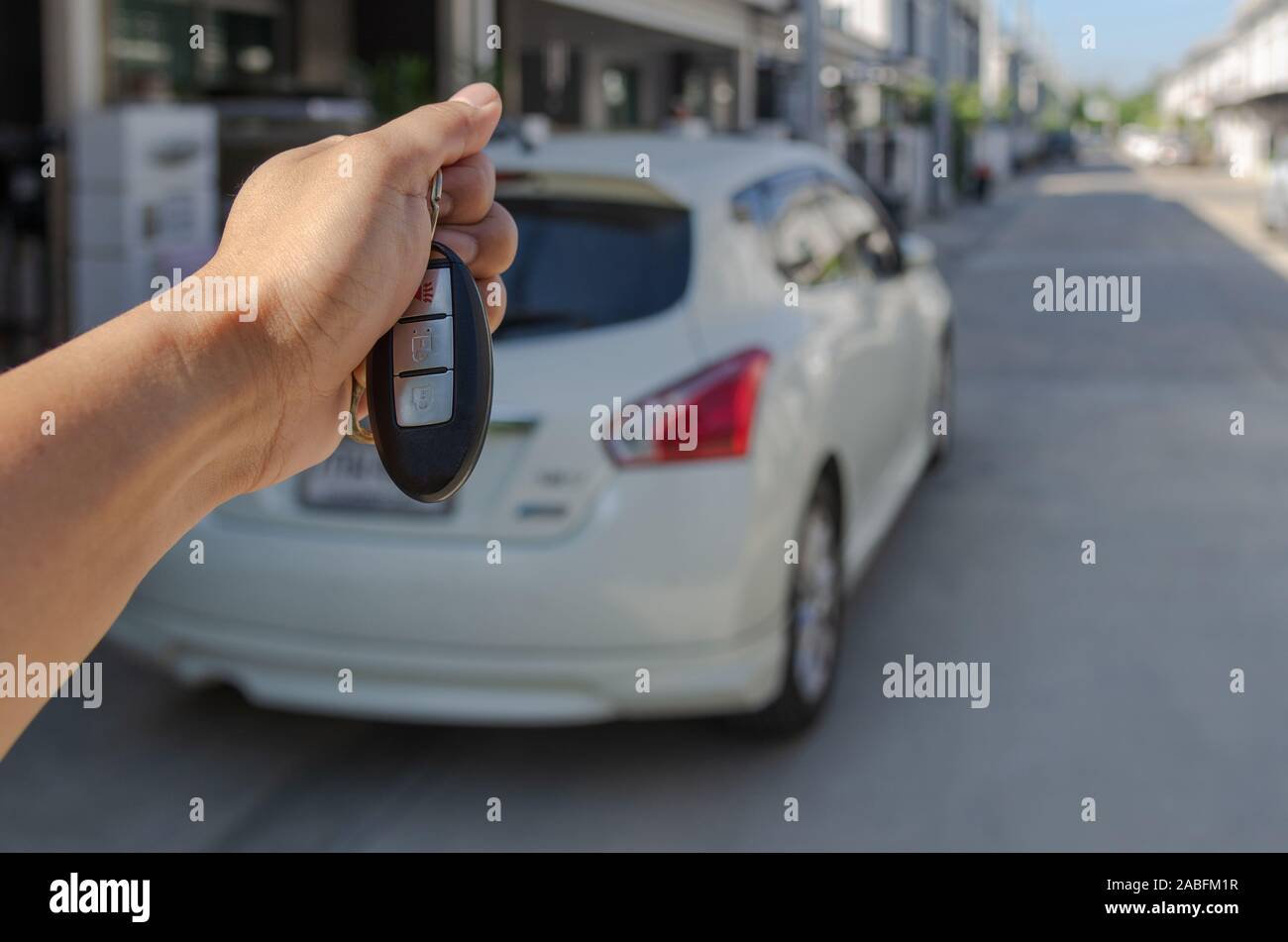 Hand holding a remote car key Stock Photo