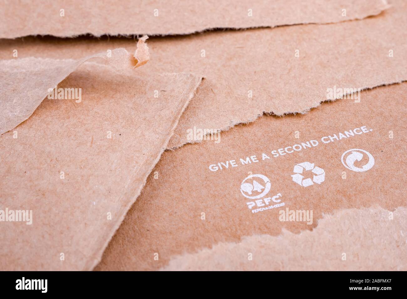 Wastepaper background. Reuse background. Words on craft paper. Give me a second chance. World resources concept. Reusing paper-based products. Ecological problems. Reusing concept Stock Photo