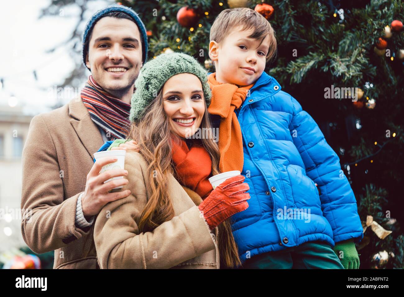 Family visiting Christmas Market Stock Photo Alamy