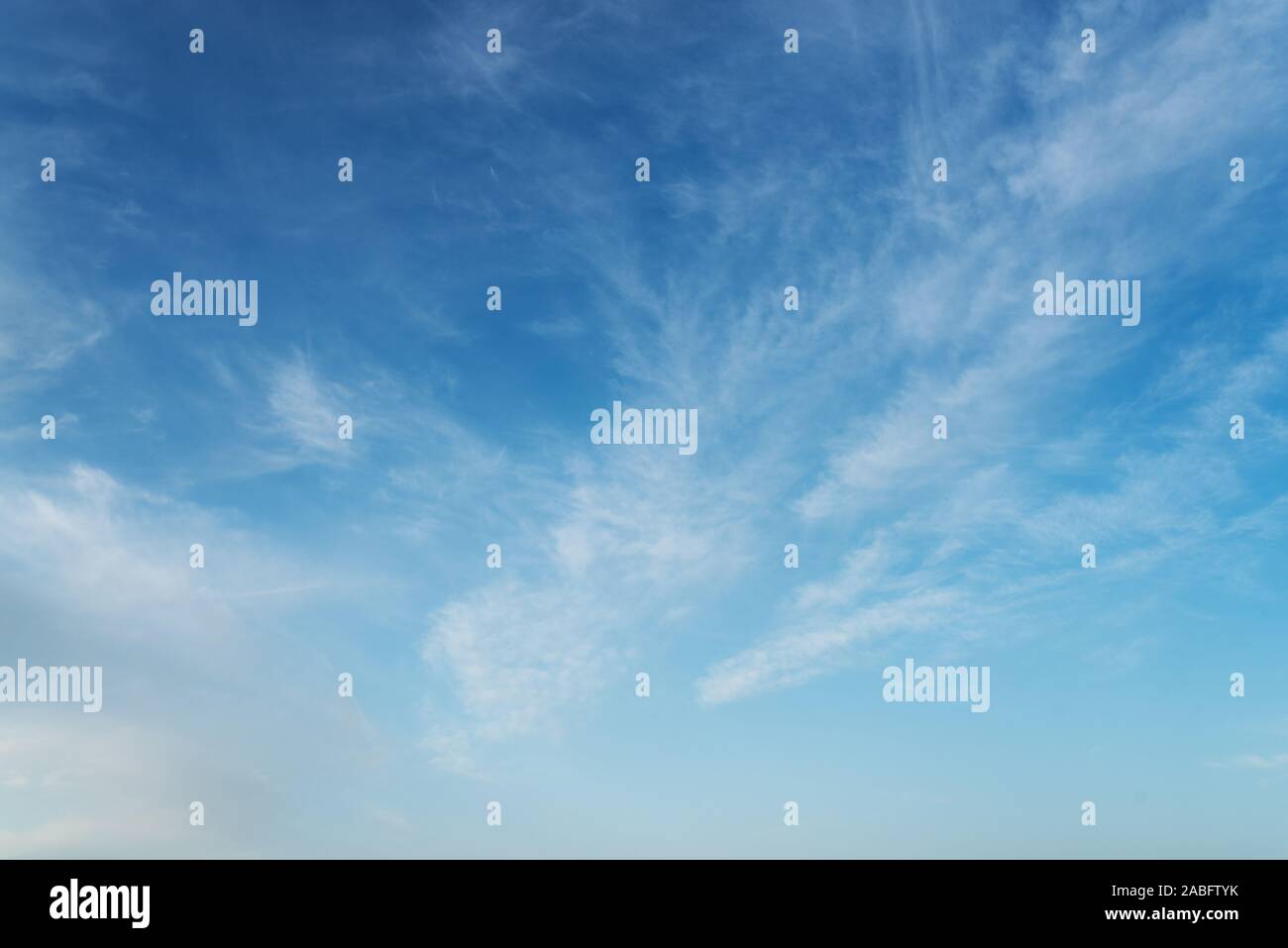 beautiful blue sky with cirrostratus clouds on sunny day background Stock Photo