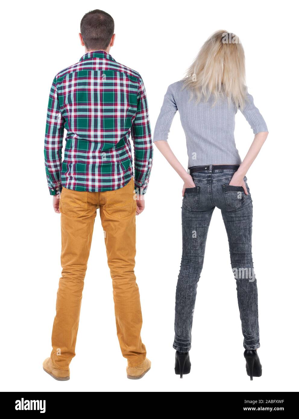 Back view of couple. beautiful friendly girl and guy together. Rear ...