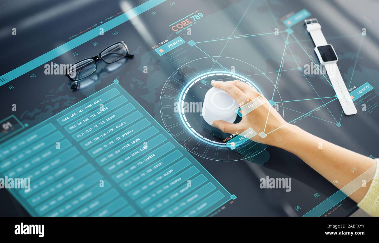 hand with control knob on interactive panel Stock Photo