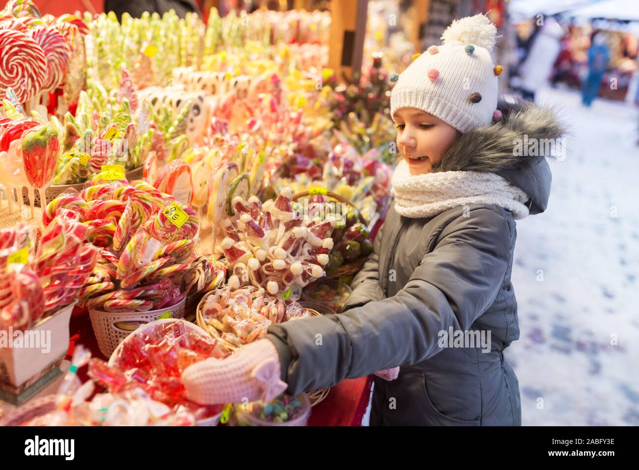 Sweets Choose little girl choosing sweets at christmas market Stock Photo - Alamy