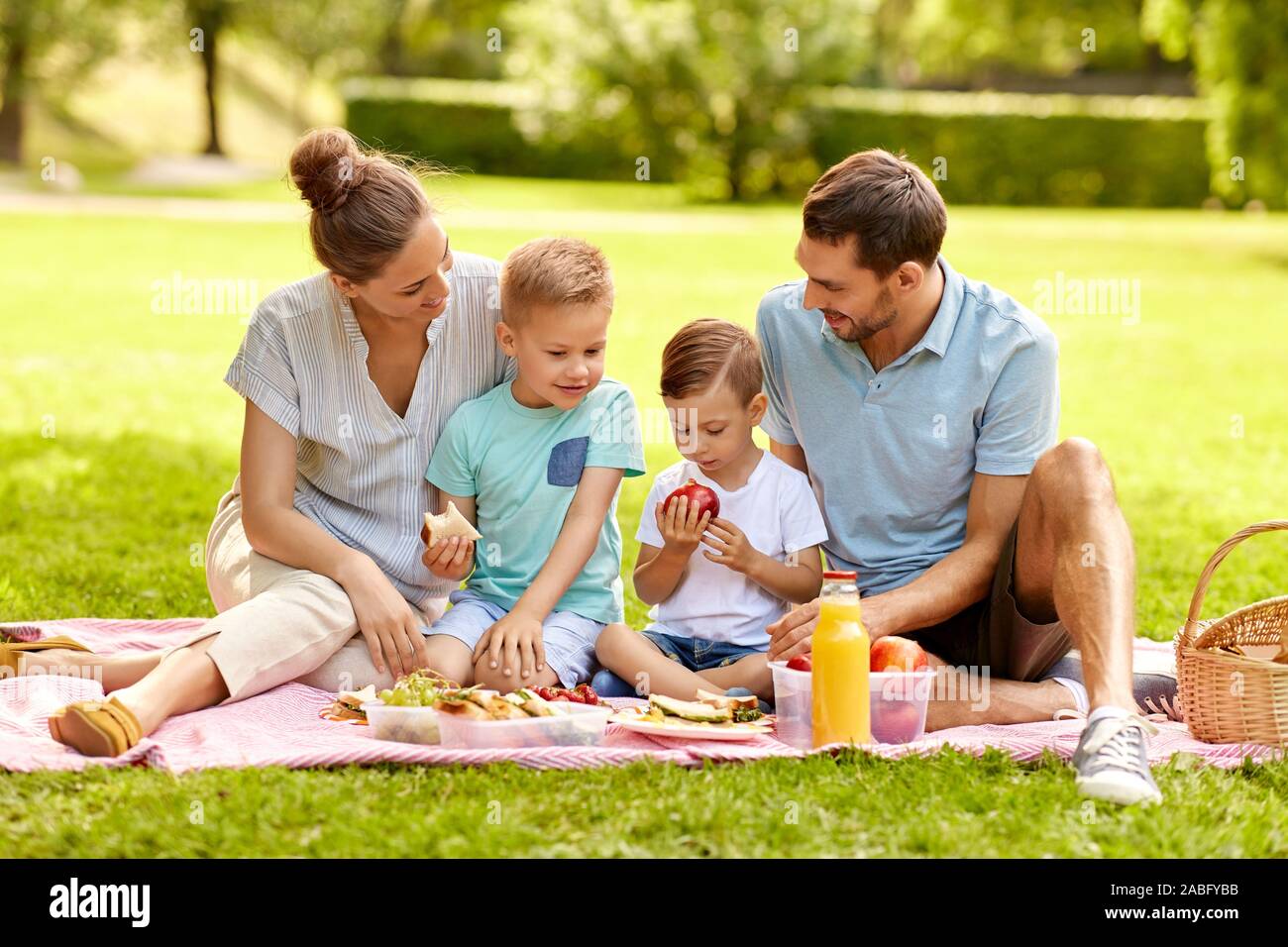 Happy Family Having Picnic At Summer Park Stock Photo Alamy