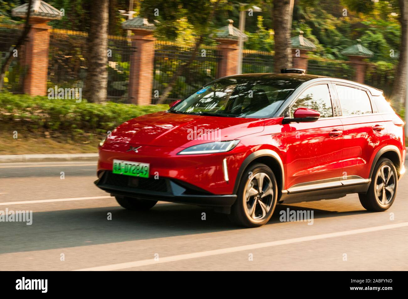 An Xpeng G3 From A Chinese Ev Startup Driving By In Guangzhou Stock Photo Alamy