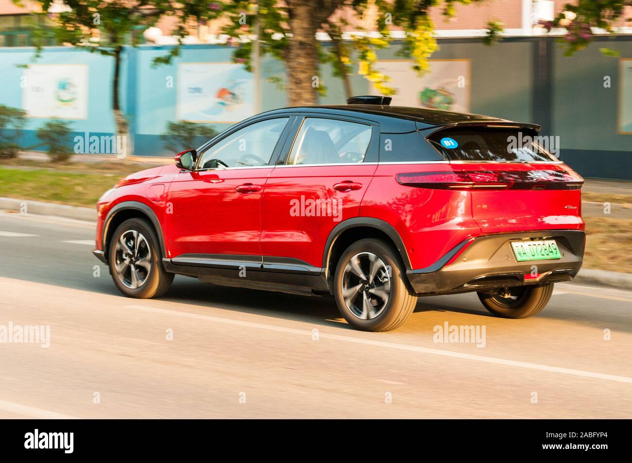 An Xpeng G3, from a Chinese EV startup, driving by in Guangzhou. Stock Photo