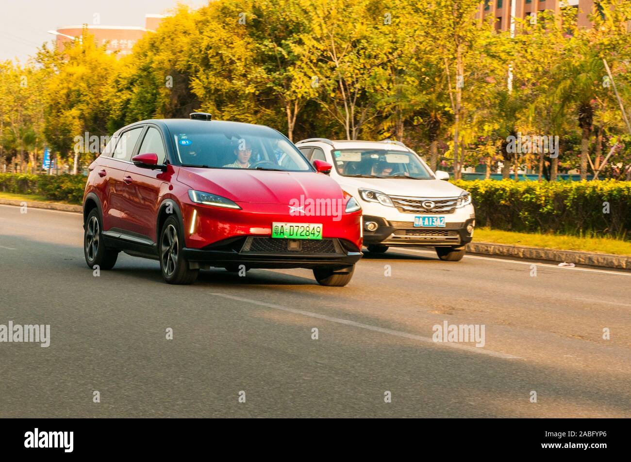 An Xpeng G3, from a Chinese EV startup, driving by in Guangzhou. Stock Photo