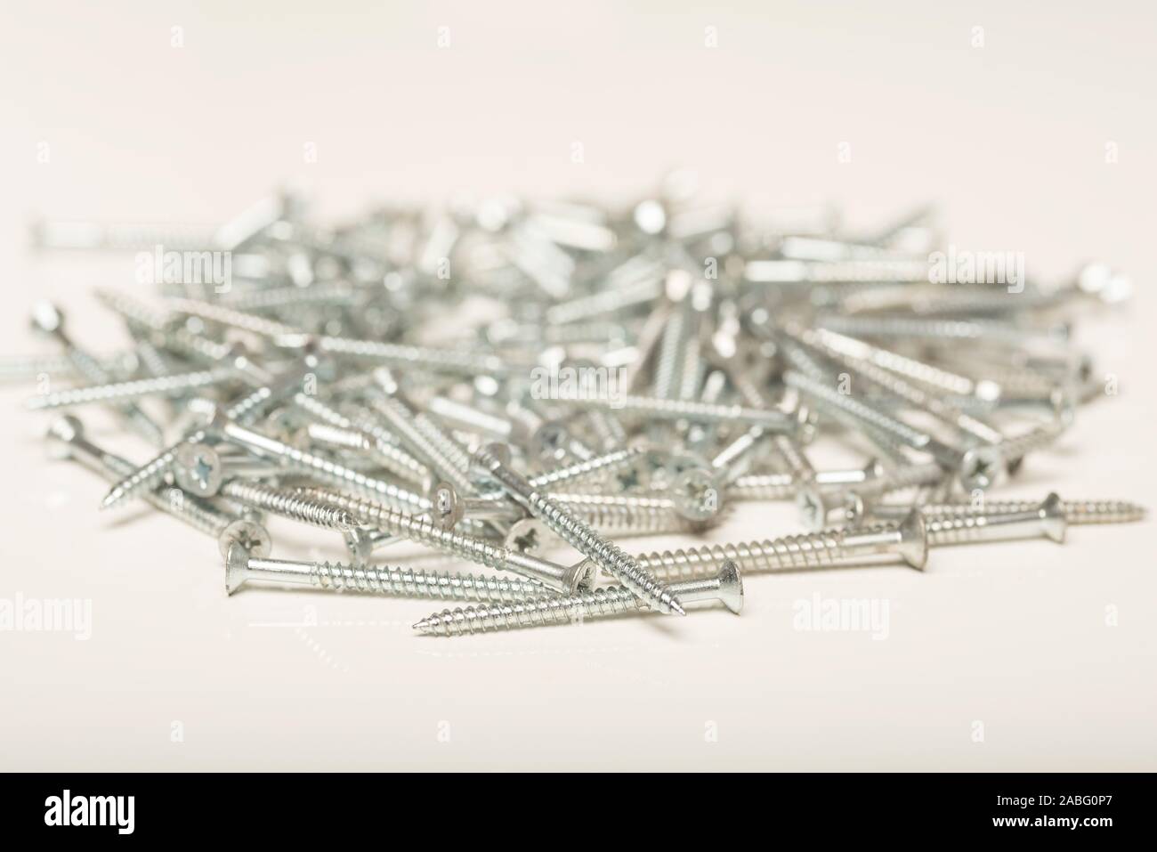 Close up shot of bright zinc plated wood screws with a countersunk